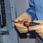 Klein Tools 32293 Insulated Screwdriver, 2-in-1 Screwdriver Set with Flip Blade, #2 Phillips and1/4-Inch Slotted Tips, Double-Ended Blades - Image 5